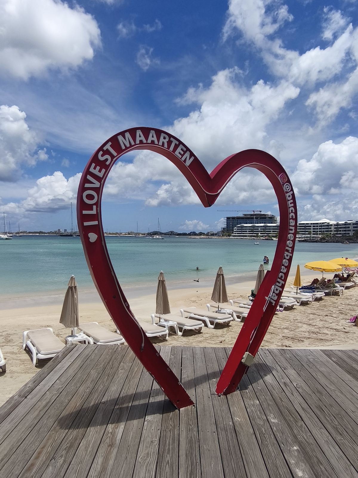 Iconic red I Love St Maarten heart sculpture on the beach